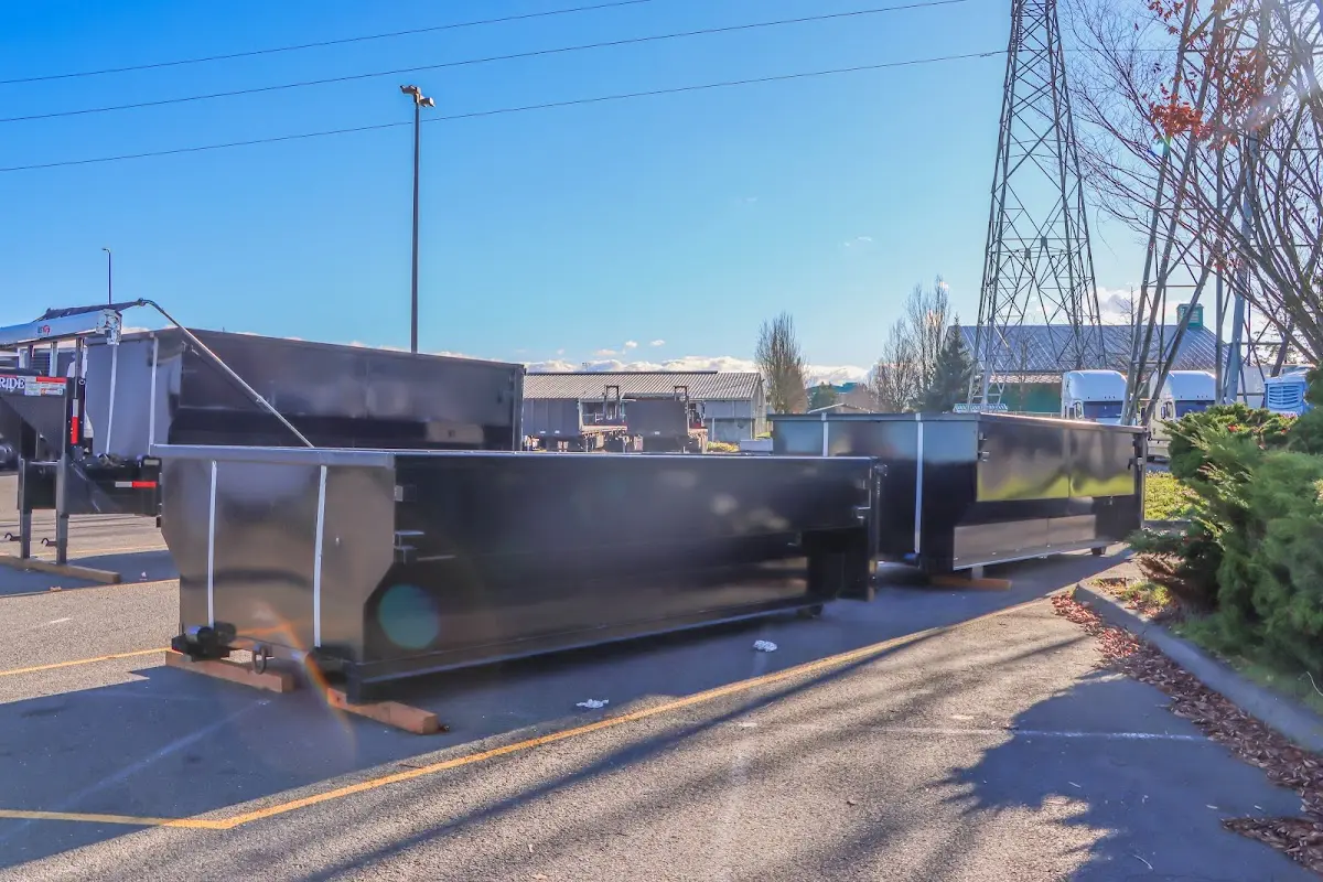 Roll-off dumpster ready for waste disposal at job site for 15 Yard Dumpster Rental in Kyle